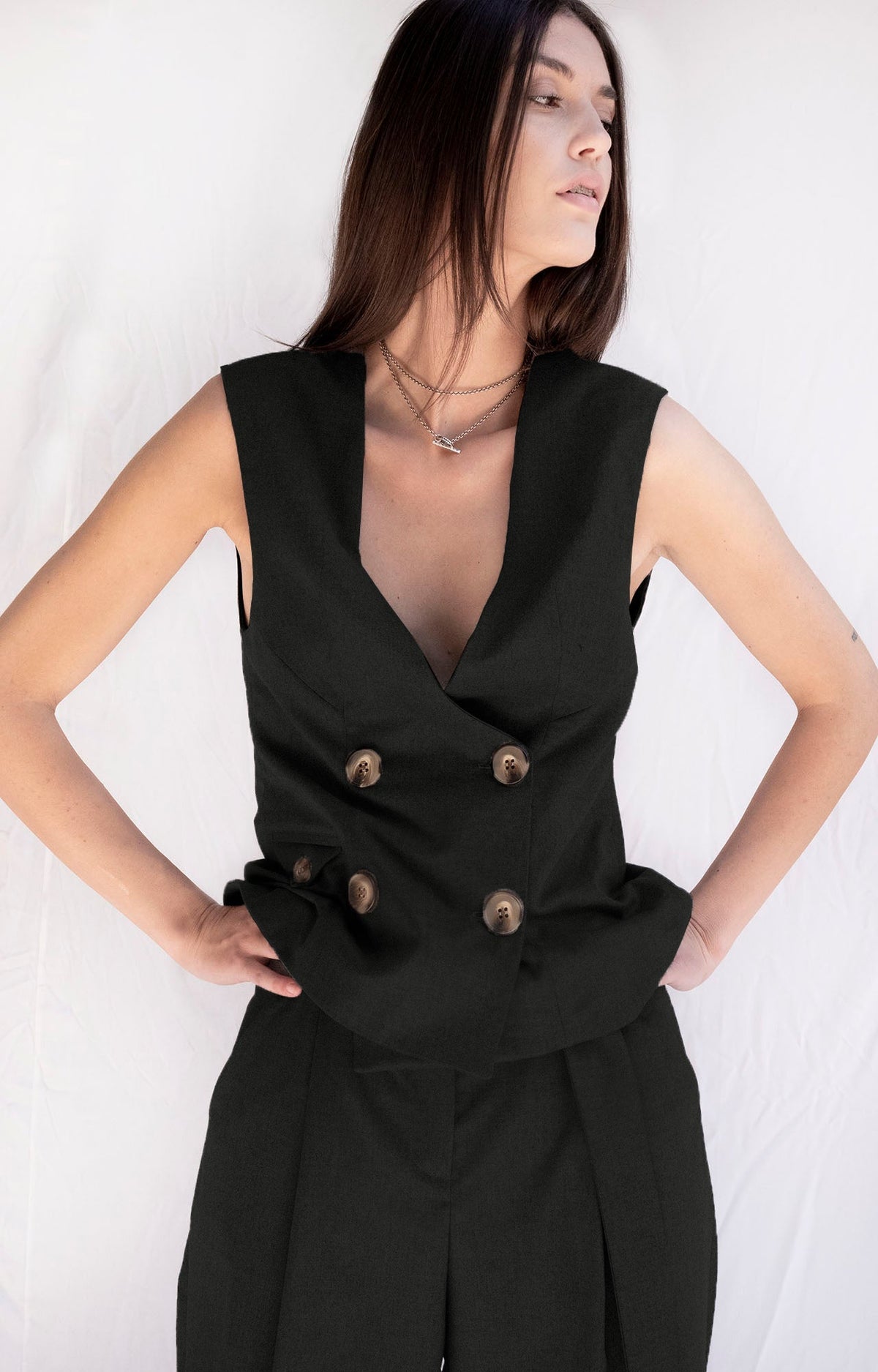 A woman in an W.two silk shirt