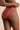 Culotte en coton biologique et dentelle recyclée de couleur terracotta.