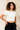 white crop top, recycled sports bras, sustainable activewear leggings, organic yoga pants, vegan activewear for women, sustainable workout brands, sustainable workout clothes for women, fair trade workout clothes, athletic wear sustainable, eco friendly workout gear