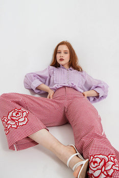 A woman in an W.two silk shirt