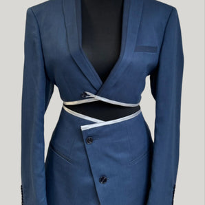 Upcycled blue blazer set, transformed from a men's blazer into a cropped jacket and high-waisted mini skirt.