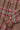 Women's pink and hazelnut check shirt, close up of the gathered frill cuff and button placket. Saywood's Marie A-line Gathered Neck Blouse, made in London, UK.