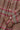 Close-up of Marie pink check blouse gathered frill cuff and button placket, surplus fabric made in London by Saywood