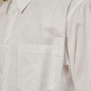 Close up of Saywood's Eddy Mens white Shirt showing the patch pockets with cotton herringbone tape on one corner.