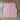 Pink Mohair pointelle knit vest on a wooden surface