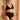 Jeune femme blonde de face porte un ensemble de lingerie noir en coton bio et tulle recyclée de la marque parisienne Olly.