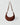 A dark brown HYER GOODS Piccola Ring Bag crescent-shaped shoulder bag made of suede, featuring a single adjustable shoulder strap with gold-tone hardware, set against a light gray background #color_chocolate-suede