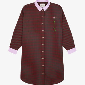 Womens red check shirtdress with lilac collar and cuffs. A flower embroidery runs through the right chest pocket.
