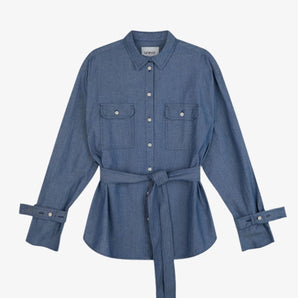 Womens Oversized Shirt Denim. Zadie Boyfriend Fit Shirt in Japanese Denim, light mid wash, with safari styling details, utility patch pockets, with a detachable tie belt and sleeve cuff details, by Saywood.