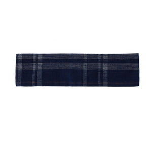 Navy check headband, laid flat on a white background.