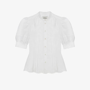 Womens white puff sleeve blouse, with scalloped hem and soft darts at the waist for fit and flare shaping. Joni Blouse with lace trim on grandad collar, made in the UK. By Saywood