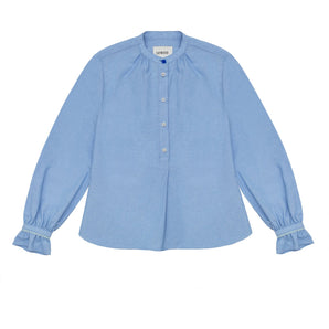Womens Pale Blue Blouse, A-line shape with Gathered Neck and Frill cuffs. Marie Blouse by Saywood in pale blue recycled cotton. Vintage glass button at neck of the limited edition version.