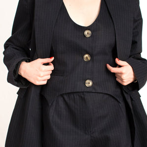 dark navy blue striped blazer with shoulder pads and front buttons